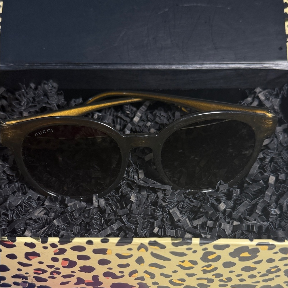 Gucci Black and Gold Sunglasses